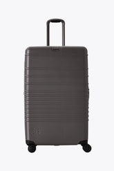 Resale The Large Check-In Roller in Charcoal