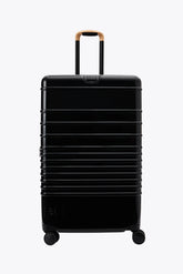 Resale The Large Check-In Roller in Glossy Black