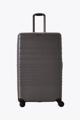 Resale The Large Check-In Roller in Charcoal